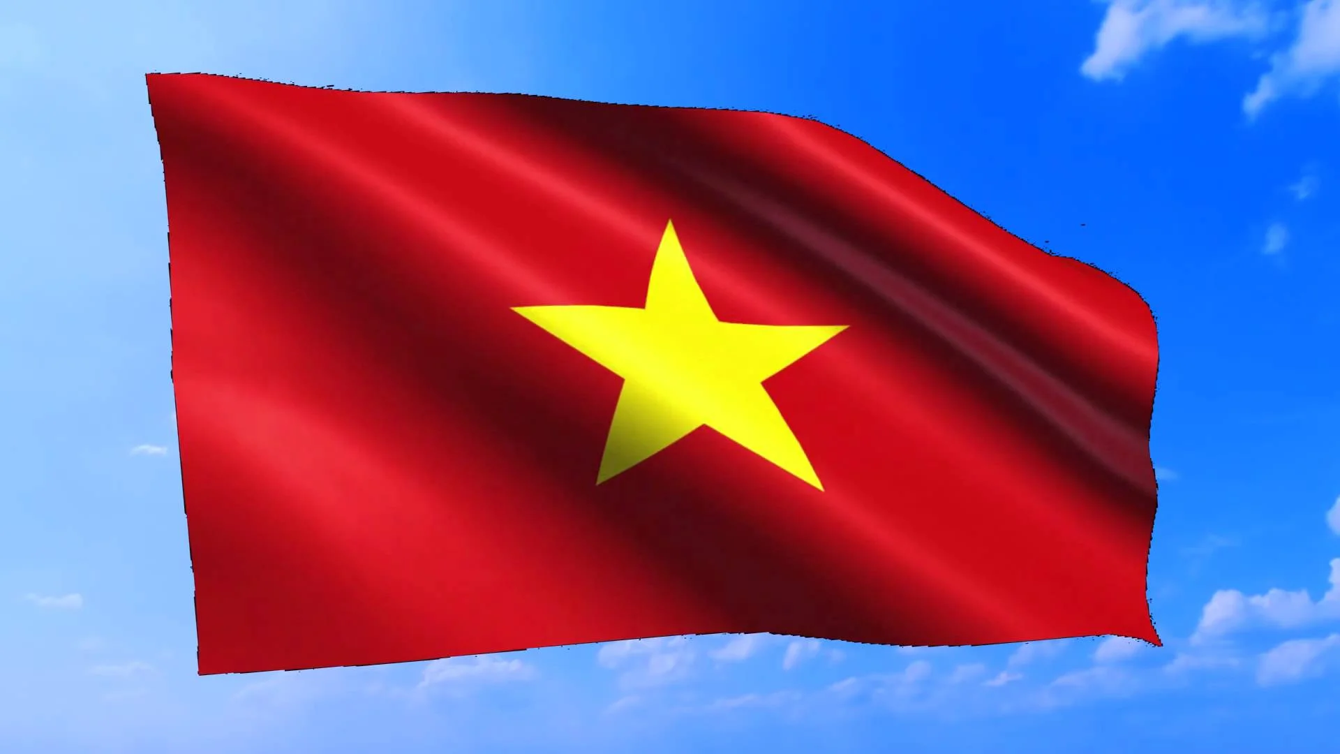 Ảnh cờ đỏ sao vàng bay trên bầu trời xanh mây trắng