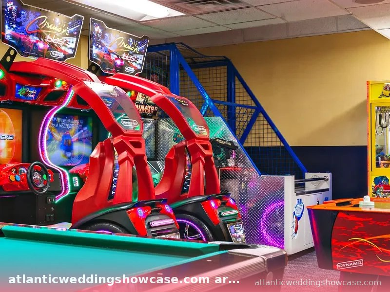 Bộ sưu tập trò chơi điện tử arcade tại atlanticweddingshowcase.com với các máy đua xe và bàn bida.